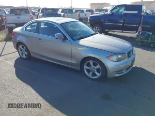 2011 BMW 1 Series 128i with VIN WBAUP7C53BVP21588, listed as a IAAI auction lot 41484300 with 52,124 mi miles. Bid and sale history available at carsss.com. Image 1.