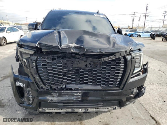 2021 GMC Yukon XL Denali with VIN 1GKS2JKL7MR217440, listed as a Copart auction lot 51016115 with 116,684 mi miles and Salvage Title. Bid and sale history available at carsss.com. Image 5.