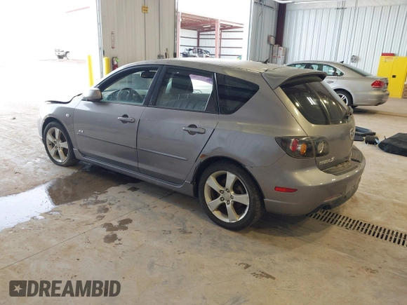 2004 Mazda 3 s with VIN JM1BK343441217463, listed as a IAAI auction lot 41957324 with 219,311 mi miles and . Bid and sale history available at DreamBid. Image 3.