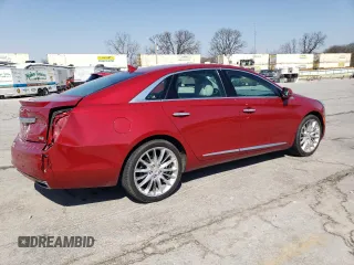 2013 Cadillac XTS Platinum z VIN 2G61V5S32D9174001, wystawiony jako Copart lot #48696365 z przebiegiem 94 028 mil mil oraz Szkoda całkowita • Salvage title. Historia ofert i sprzedaży dostępna na DreamBid. Obrazek 3.