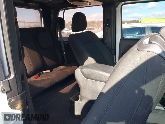 2021 Jeep Wrangler Sport S with VIN 1C4HJXAG0MW757133, listed as a IAAI auction lot 41028980 with 53,165 mi miles and . Bid and sale history available at DreamBid. Image 8.