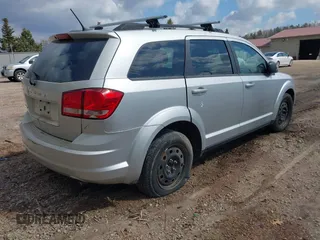 2014 Dodge Journey SE with VIN 3C4PDCAB2ET166065, listed as a IAAI auction lot 42137057 with 194,775 mi miles. Bid and sale history available at carsss.com. Image 4.