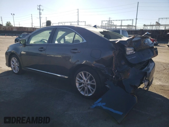 2010 Lexus HS 250h with VIN JTHBB1BA0A2001703, listed as a Copart auction lot 77886284 with 105,912 mi miles and Salvage Title. Bid and sale history available at DreamBid. Image 2.