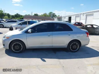 2009 Toyota Yaris with VIN JTDBT903891331057, listed as a IAAI auction lot 41849148 with 182,142 mi miles. Bid and sale history available at carsss.com. Image 14.