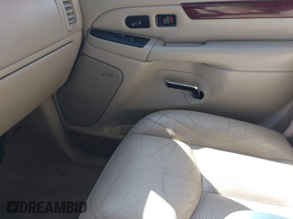 2005 Cadillac Escalade z VIN 1GYEC63N65R243624, wystawiony jako IAAI lot #42161106 z przebiegiem 150 877 mil mil oraz . Historia ofert i sprzedaży dostępna na DreamBid. Obrazek 6.