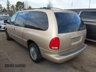 1999 Chrysler Town & Country LXi with VIN 1C4GP54L8XB612991, listed as a IAAI auction lot 41669165 with 199,327 mi miles and . Bid and sale history available at DreamBid. Image 3.