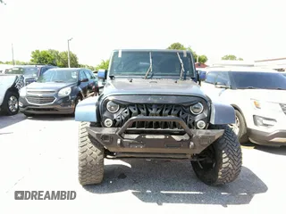 2013 Jeep Wrangler Unlimited Sport z VIN 1C4BJWDG1DL660844, wystawiony jako IAAI lot #42347284 z przebiegiem 168 709 mil mil oraz . Historia ofert i sprzedaży dostępna na DreamBid. Obrazek 12.