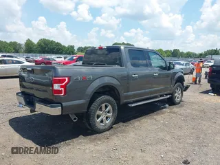 2019 Ford F-150 XL with VIN 1FTEW1E52KKE98899, listed as a IAAI auction lot 42576904 with 168,223 mi miles and . Bid and sale history available at DreamBid. Image 4.