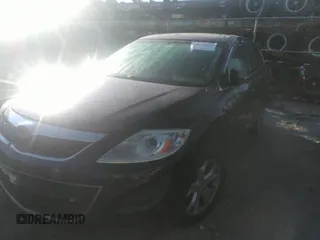2011 Mazda CX-9 Touring with VIN JM3TB2CA7B0330879, listed as a IAAI auction lot 40628534 with 159,256 mi miles and . Bid and sale history available at DreamBid. Image 2.