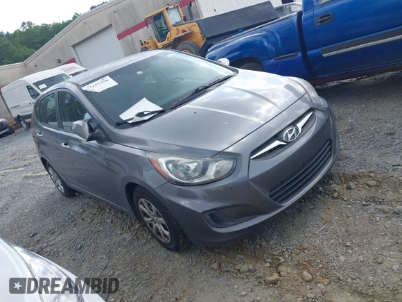 2014 Hyundai Accent GS with VIN KMHCT5AE3EU141605, listed as a IAAI auction lot 42157550 with 174,197 mi miles. Bid and sale history available at carsss.com. Image 1.