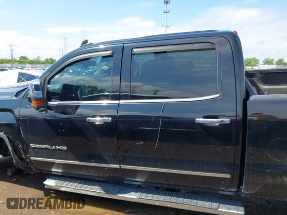 2016 GMC Sierra 2500HD Denali z VIN 1GT12UE84GF259750, wystawiony jako IAAI lot #42221632 z przebiegiem 201 055 mil mil oraz . Historia ofert i sprzedaży dostępna na DreamBid. Obrazek 15.