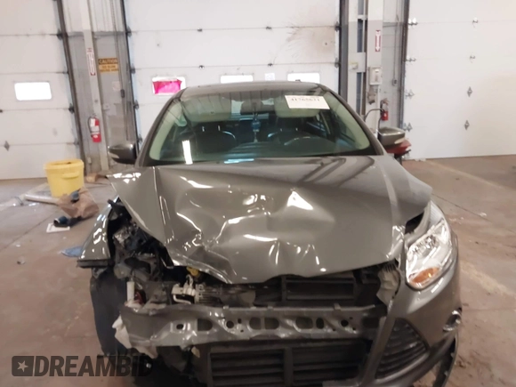 2013 Ford Focus Titanium with VIN 1FADP3J23DL265049, listed as a IAAI auction lot 41765621 with 100,550 mi miles and . Bid and sale history available at carsss.com. Image 12.