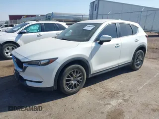 2017 Mazda CX-5 Sport with VIN JM3KFABL5H0124725, listed as a IAAI auction lot 40487298 with 103,889 mi miles. Bid and sale history available at carsss.com. Image 2.