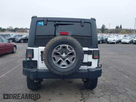 2014 Jeep Wrangler Unlimited Rubicon with VIN 1C4BJWFGXEL283929, listed as a IAAI auction lot 41812052 with 137,790 mi miles and . Bid and sale history available at DreamBid. Image 16.