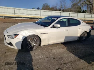 2015 Maserati Ghibli with VIN ZAM57XSA5F1146330, listed as a Copart auction lot 51218475 with 162,186 mi miles and Salvage Title. Bid and sale history available at carsss.com. Image 1.