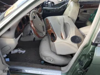 1999 Jaguar XJ with VIN SAJKX6049XC854232, listed as a Copart auction lot 76191414 with 0 mi miles and Salvage Title. Bid and sale history available at carsss.com. Image 7.