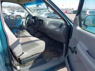 1998 Ford F-150 with VIN 1FTZF1723WNC12776, listed as a IAAI auction lot 41599872 with 125,007 mi miles and . Bid and sale history available at DreamBid. Image 5.
