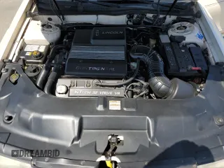 1995 Lincoln Continental z VIN 1LNLM97V3SY641554, wystawiony jako Copart lot #55001165 z przebiegiem 173 490 mil mil oraz Szkody całkowita. Historia ofert i sprzedaży dostępna na DreamBid. Obrazek 11.