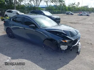2024 Mazda 3 S Carbon Edition with VIN 3MZBPBCM2RM403824, listed as a IAAI auction lot 42612315 with 8,261 mi miles and . Bid and sale history available at DreamBid. Image 1.
