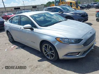 2017 Ford Fusion Hybrid SE with VIN 3FA6P0LU4HR234101, listed as a IAAI auction lot 42579447 with 169,273 mi miles and . Bid and sale history available at DreamBid. Image 1.