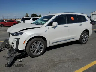 2022 Cadillac XT6 Premium Luxury with VIN 1GYKPDRS1NZ177167, listed as a Copart auction lot 58866965 with 26,357 mi miles and Salvage title. Bid and sale history available at DreamBid. Image 1.