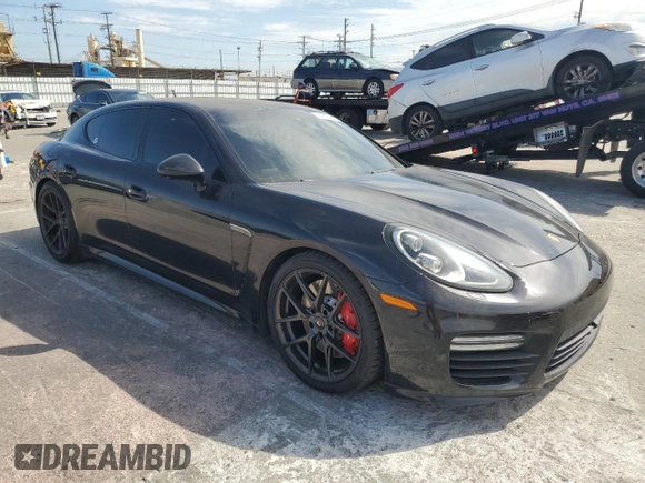 2014 Porsche Panamera Turbo z VIN WP0AC2A72EL073234, wystawiony jako Copart lot #65813464 z przebiegiem 83 918 mil mil oraz Szkoda całkowita • Salvage title. Historia ofert i sprzedaży dostępna na DreamBid. Obrazek 4.
