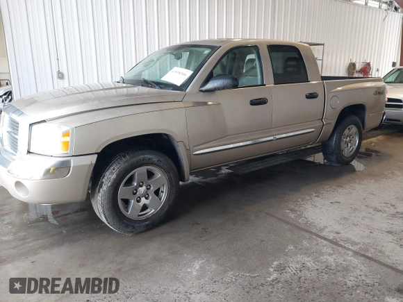 2005 Dodge Dakota Laramie with VIN 1D7HW58N15S159061, listed as a IAAI auction lot 41898306 with 114,288 mi miles and . Bid and sale history available at DreamBid. Image 2.