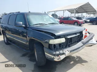 2003 Chevrolet Suburban LS z VIN 3GNEC16TX3G243519, wystawiony jako IAAI lot #42451637 z przebiegiem 133 806 mil mil oraz . Historia ofert i sprzedaży dostępna na DreamBid. Obrazek 1.