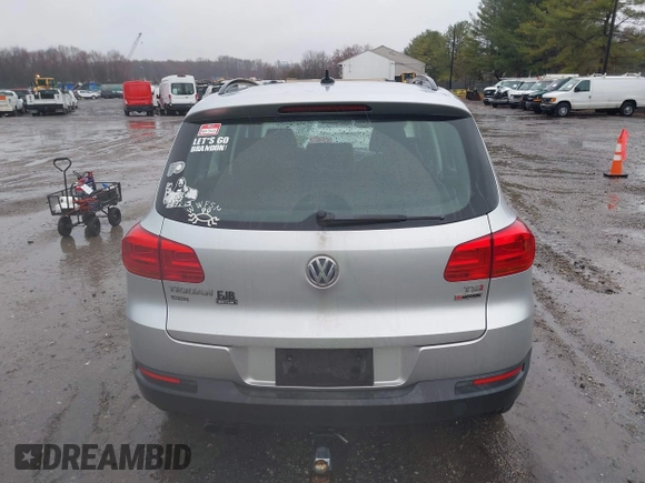 2017 Volkswagen Tiguan S with VIN WVGBV7AX4HK051172, listed as a IAAI auction lot 41843182 with 160,010 mi miles and . Bid and sale history available at DreamBid. Image 17.