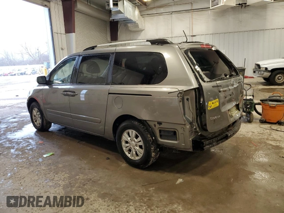 2012 Kia Sedona LX with VIN KNDMG4C72C6441773, listed as a Copart auction lot 79008684 with 167,143 mi miles and Clean Title. Bid and sale history available at DreamBid. Image 2.