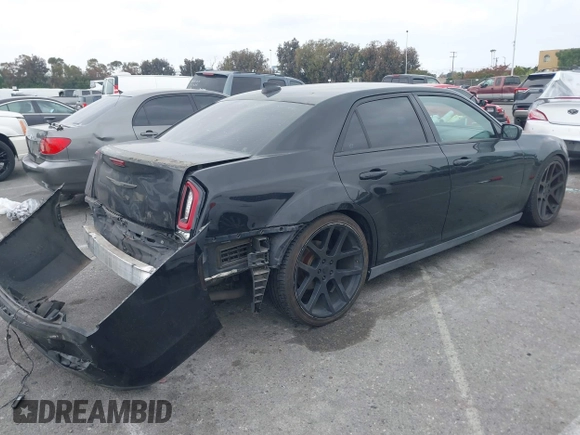 2015 Chrysler 300 S z VIN 2C3CCABG5FH766299, wystawiony jako IAAI lot #42252742 z przebiegiem 146 255 mil mil oraz . Historia ofert i sprzedaży dostępna na DreamBid. Obrazek 4.