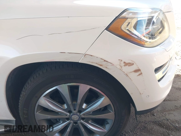 2014 Mercedes-Benz GL 450 with VIN 4JGDF7CE3EA336481, listed as a IAAI auction lot 42025576 with 145,244 mi miles and . Bid and sale history available at DreamBid. Image 6.