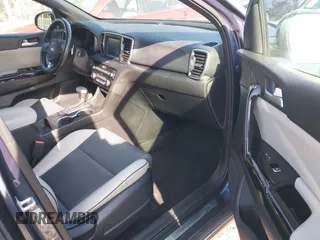 2019 Kia Sportage EX with VIN KNDPNCAC7K7615908, listed as a IAAI auction lot 42004220 with 86,654 mi miles. Bid and sale history available at carsss.com. Image 5.