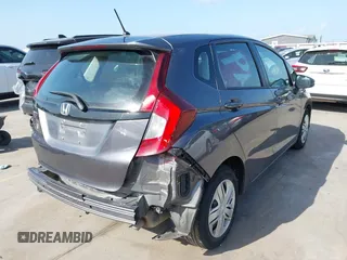 2020 Honda Fit LX with VIN 3HGGK5H46LM725764, listed as a IAAI auction lot 42499144 with 79,758 mi miles and . Bid and sale history available at DreamBid. Image 4.