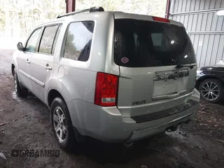 2011 Honda Pilot Touring with VIN 5FNYF4H90BB084692, listed as a IAAI auction lot 41867622 with 62,805 mi miles. Bid and sale history available at carsss.com. Image 3.