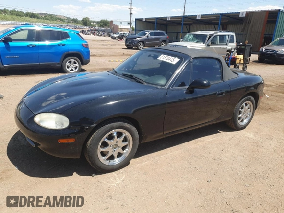 1999 Mazda MX-5 Miata with VIN JM1NB3535X0119662, listed as a Copart auction lot 61870445 with 84,787 mi miles and Clean title. Bid and sale history available at DreamBid. Image 1.
