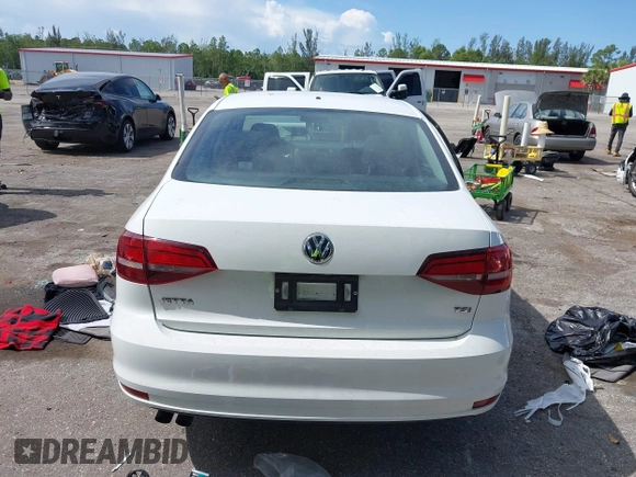 2017 Volkswagen Jetta S with VIN 3VW2B7AJXHM374687, listed as a IAAI auction lot 42596302 with 63,728 mi miles and . Bid and sale history available at DreamBid. Image 16.