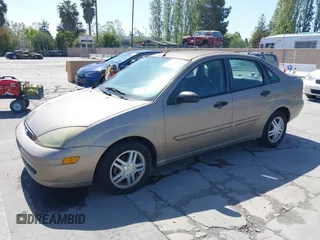 2004 Ford Focus SE with VIN 1FAFP34354W103841, listed as a IAAI auction lot 42099046 with 112,231 mi miles and . Bid and sale history available at DreamBid. Image 2.