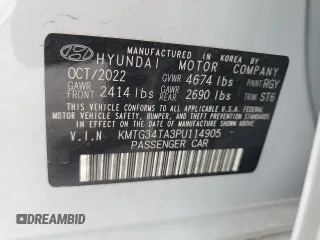 2023 Genesis G70 2.0T with VIN KMTG34TA3PU114905, listed as a Copart auction lot 61777435 with 26,493 mi miles and Salvage title. Bid and sale history available at DreamBid. Image 13.