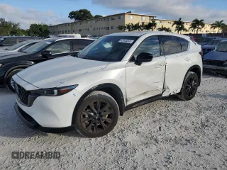 2024 Mazda CX-5 2.5 Carbon Turbo with VIN JM3KFBAY3R0445814, listed as a Copart auction lot 43348095 with 5,257 mi miles and Salvage Title. Bid and sale history available at carsss.com. Image 1.