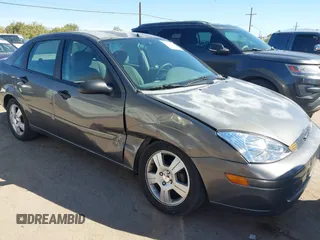 2003 Ford Focus SE with VIN 1FAFP34353W228000, listed as a IAAI auction lot 41682503 with 107,968 mi miles and . Bid and sale history available at carsss.com. Image 6.