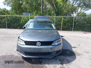 2014 Volkswagen Jetta S z VIN 3VW2K7AJ3EM221290, wystawiony jako IAAI lot #42310867 z przebiegiem 118 062 mil mil oraz . Historia ofert i sprzedaży dostępna na DreamBid. Obrazek 13.
