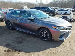 2019 Toyota Camry LE z VIN 4T1B11HK5KU756156, wystawiony jako IAAI lot #41452130 z przebiegiem 107 672 mil mil oraz . Historia ofert i sprzedaży dostępna na DreamBid. Obrazek 1.