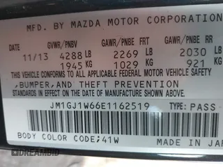 2014 Mazda 6 i Grand Touring with VIN JM1GJ1W66E1162519, listed as a IAAI auction lot 41801957 with 121,586 mi miles. Bid and sale history available at carsss.com. Image 9.