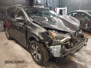 2018 Toyota RAV4 XLE with VIN JTMRFREV9JJ224779, listed as a IAAI auction lot 41888255 with 137,973 mi miles. Bid and sale history available at carsss.com. Image 1.