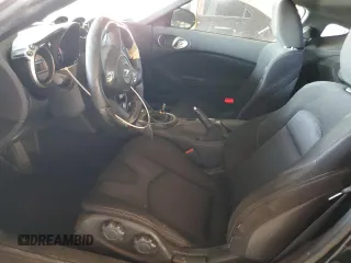 2009 Nissan 370Z z VIN JN1AZ44E19M411715, wystawiony jako Copart lot #56654815 z przebiegiem 123 791 mil mil oraz Szkoda całkowita • Salvage title. Historia ofert i sprzedaży dostępna na DreamBid. Obrazek 7.