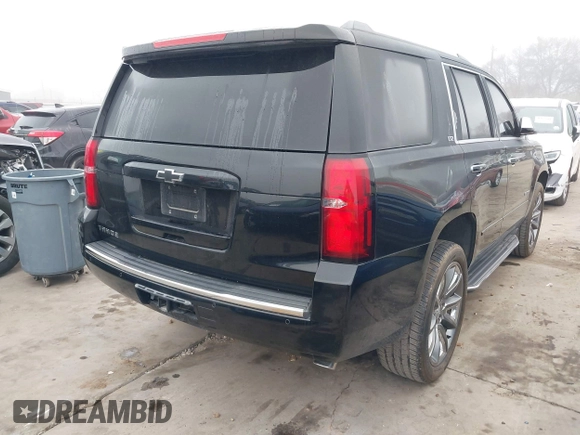 2016 Chevrolet Tahoe LTZ z VIN 1GNSCCKC2GR100879, wystawiony jako IAAI lot #41112832 z przebiegiem 213 649 mil mil oraz . Historia ofert i sprzedaży dostępna na DreamBid. Obrazek 4.
