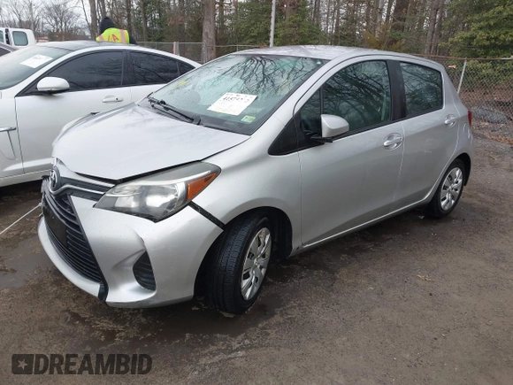 2015 Toyota Yaris L with VIN VNKKTUD33FA028588, listed as a IAAI auction lot 41575230 with 148,071 mi miles. Bid and sale history available at carsss.com. Image 2.