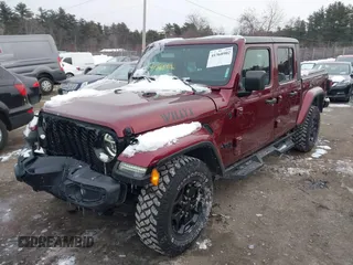 2021 Jeep Gladiator Willys with VIN 1C6HJTAG6ML571081, listed as a IAAI auction lot 41368902 with 45,077 mi miles and . Bid and sale history available at DreamBid. Image 2.