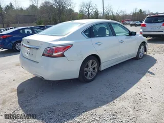 2013 Nissan Altima 2.5 S with VIN 1N4AL3AP0DC916986, listed as a IAAI auction lot 42090563 with 173,993 mi miles. Bid and sale history available at carsss.com. Image 4.
